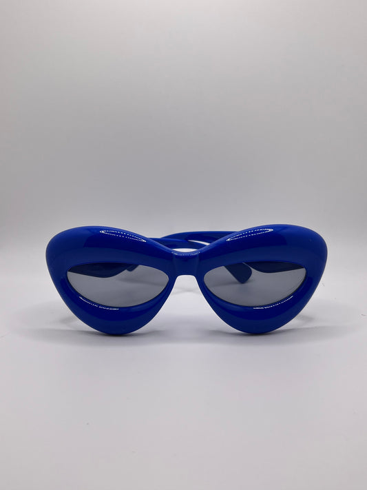  These inflated sunglasses in blue are giving effortless icon. Try them in every color and add a splash of extra to any outfit. These work for formal events or a day of errands and will make you feel glam every step of the way.