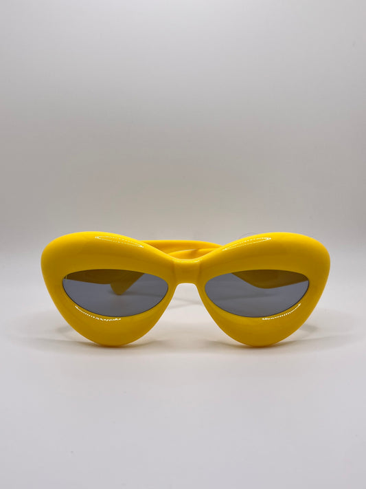 These inflated sunglasses in yellow are giving effortless icon. Try them in every color and add a splash of extra to any outfit. These work for formal events or a day of errands and will make you feel glam every step of the way.