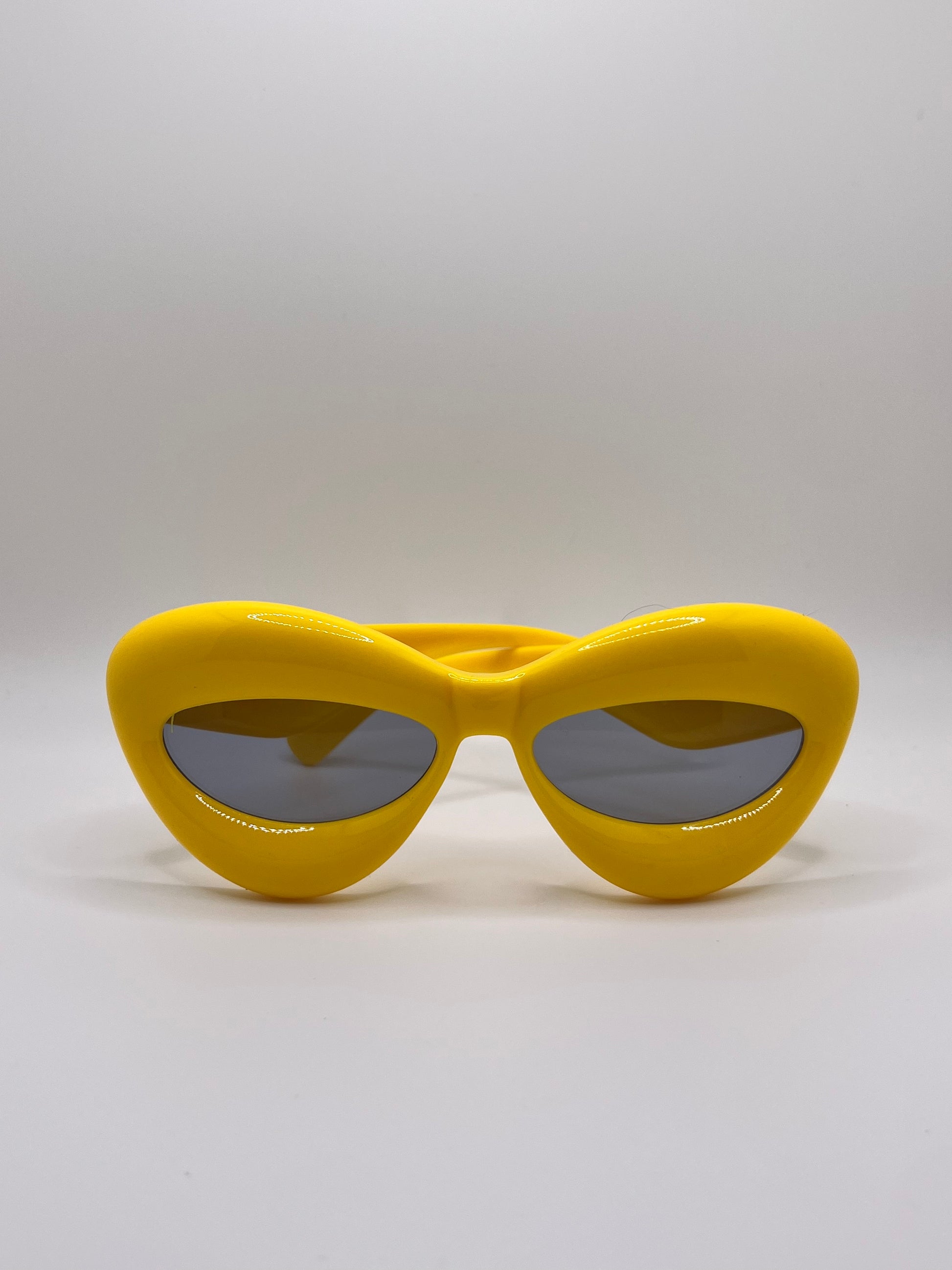 These inflated sunglasses in yellow are giving effortless icon. Try them in every color and add a splash of extra to any outfit. These work for formal events or a day of errands and will make you feel glam every step of the way.