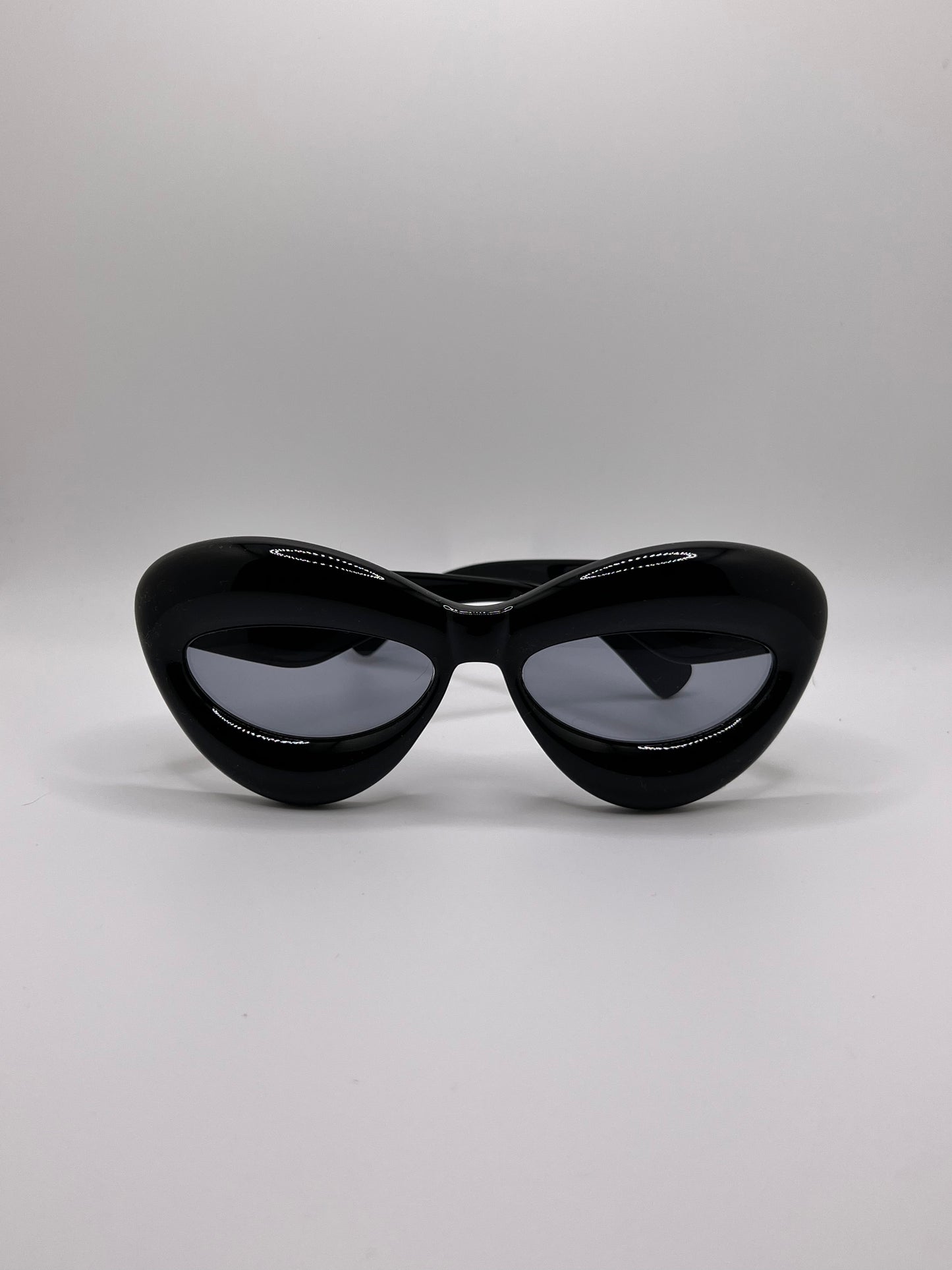  These inflated sunglasses in black are giving effortless icon. Try them in every color and add a splash of extra to any outfit. These work for formal events or a day of errands and will make you feel glam every step of the way.